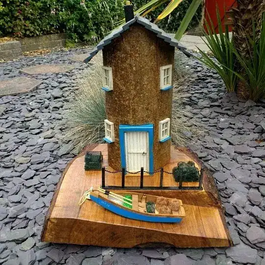A waterfront property, complete with chain-link fence and boat. The attention to detail is remarkable.
